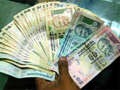 Kotak Mahindra Bank sees rupee range bound at 58-61 against US dollar