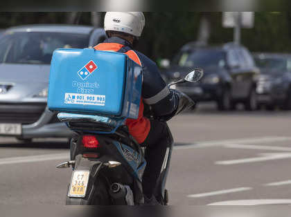 Video of Domino’s executives braving Bengaluru traffic jam to deliver pizza goes viral, netizens urge client to pay ‘a good tip’