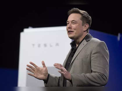 Elon Musk hints at more Tesla price cuts, with autonomy still tricky
