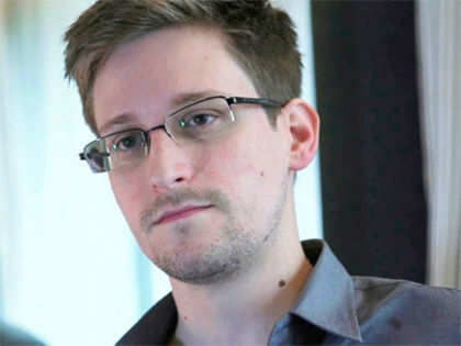 Edward Snowden journalist to publish UK secrets after Britain detains partner