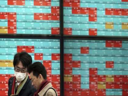 Nikkei slips on global virus woes, caution ahead of US elections
