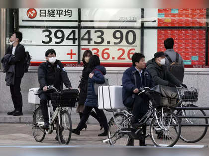 Asian stocks jump as US sticks to rate cut plan
