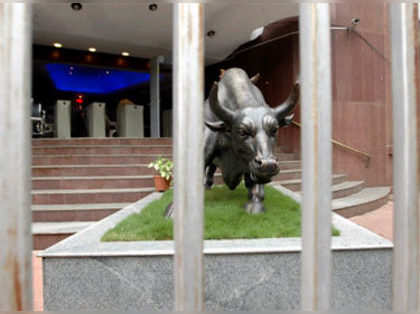 Sensex bleeds 200 points, Nifty slips below 5800; Railway stocks down