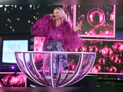 Carrie Underwood wows fans with three glittering looks at Times Square for  New Year's Eve 2025 - The Economic Times