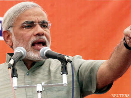 Communal plank missing, Modi fights poll on development agenda