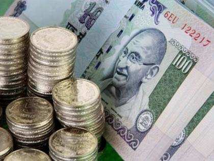 Rupee up by 12 paise vs dollar in late morning deals