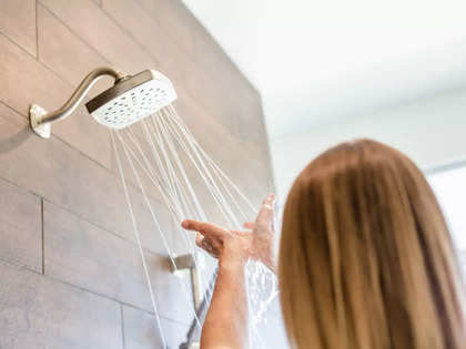 Man Removing His Underwear In The Bathroom At Home. Stock Photo