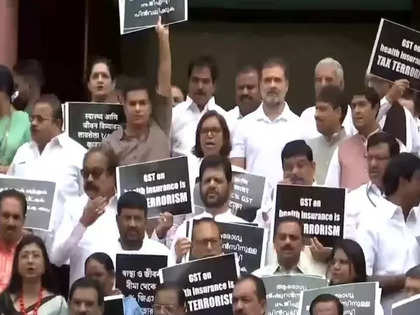 INDIA bloc protests on 18 percent GST on health and life insurance