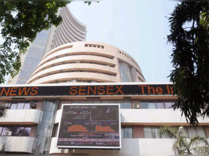 Sensex trading flat ahead of Economic survey; Mid-cap stocks plunge