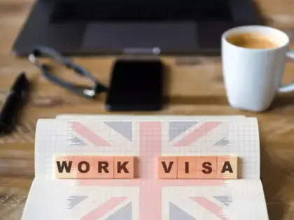 UK tightens work visas but makes room for lower-skilled office roles for now