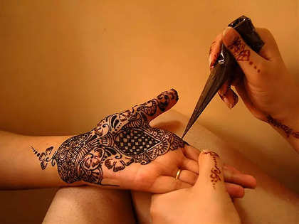 Close up of Man and Woman Hands with Henna Tattoo · Free Stock Photo