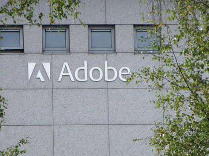Adobe drops as weak forecast fans worries about competition, AI efforts