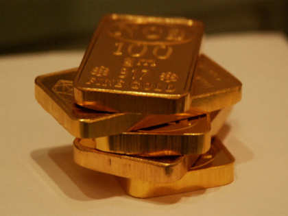 Gold futures drop Rs 72 on weak global cues; silver weakens in futures trade