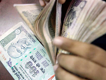 Rupee surges 30 paise vs dollar; rises to 2-week high at 63.74