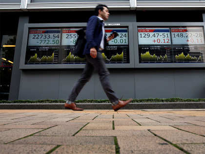 Nikkei retreats from 4.5-month high; Canon slumps on profit warning