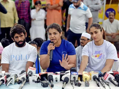 Sakshi Malik, Bajrang Punia accuse WFI of using devious means to get suspension lifted, threaten fresh protest