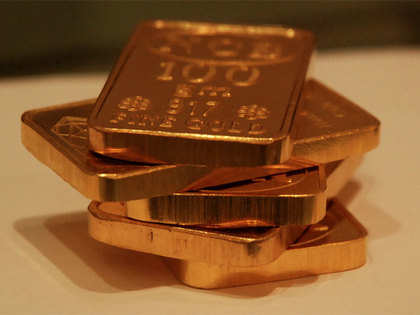 Gold futures fall Rs 37 on weak global cues, muted demand