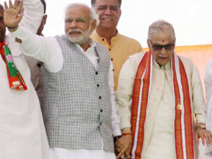 BJP's PM candidate Narendra Modi stoops to conquer hearts