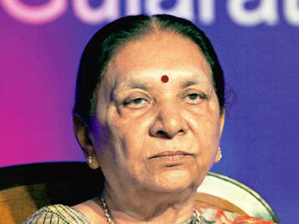 Against backdrop of controversial land deal, Anandiben Patel and Core Group meet Amit Shah