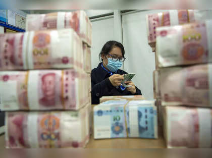 China unexpectedly leaves lending rates steady; markets expect cuts soon