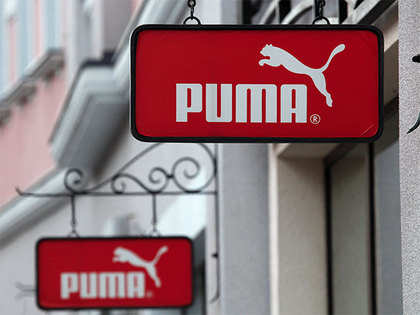 Premium Photo  A pair of puma shoes is on fire and the word  on