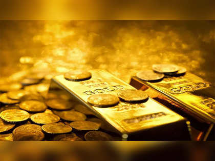 Gold ekes out gains in a tumultuous week
