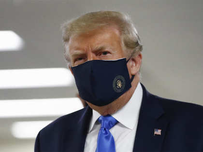 President Trump wears mask for the first time in public