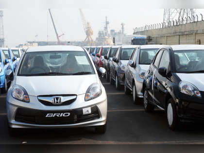Honda aims to price diesel sedan Amaze aggressively to take on segment leader Maruti's Swift Dzire