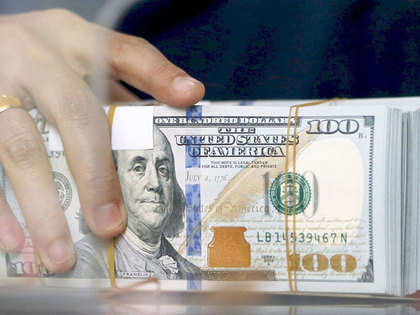 Rupee closes 11 paise lower at 65.06 against US dollar