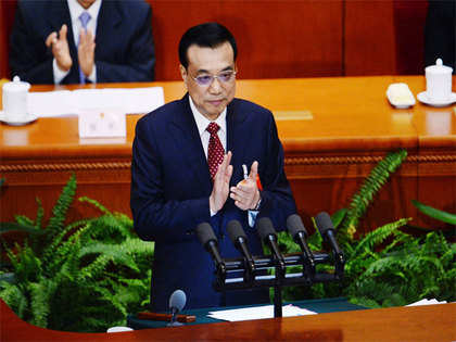 China lowers growth target to 7% as Premier Li Keqiang flags headwinds