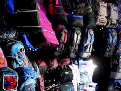 Businessmen ditch briefcases, take the softer option of backpack or messenger bag