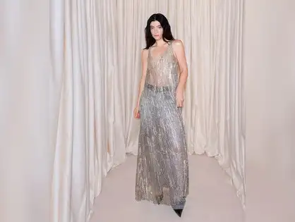 lorde silver dress Lorde sure looks ! The singer stepped out in a chic silver style  statement that turned heads at the #MetGala. (: Getty Images)