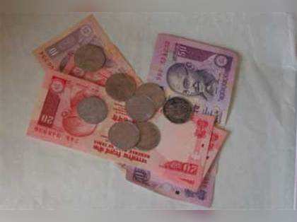 Rupee may breach 55-mark again vs dollar by year-end: Experts