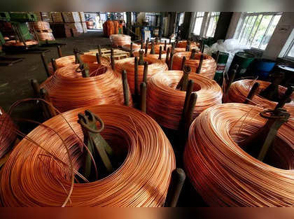 Copper hits lowest in more than five weeks on firm dollar