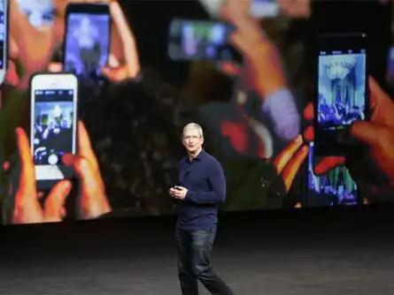 Cook takes the stage again. Next up: iPhone!