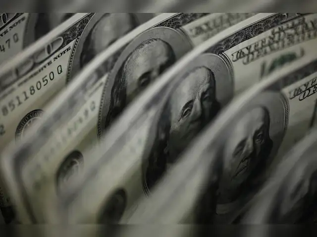 Dollar hold near two-month peak as yields rise, Fed data looms
