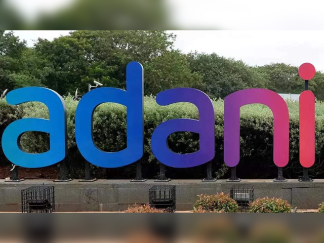 Person holding cellphone with company logo of Indian conglomerate Adani  Group on screen in front of business website. Focus on phone display Stock  Photo - Alamy