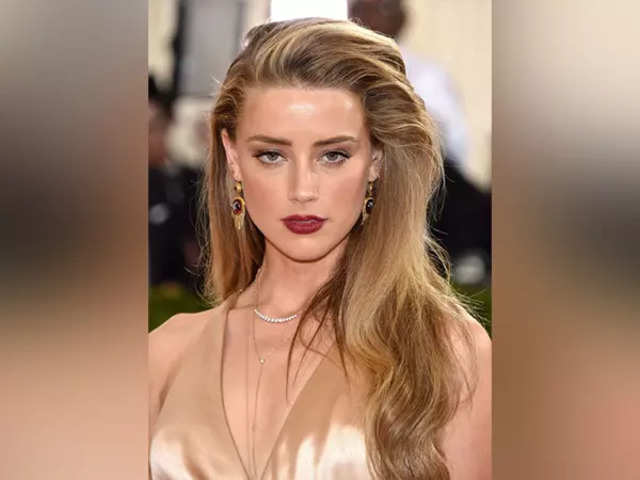 heard: Amber Heard looks for a new start in Madrid, interacts with media in  Spanish - The Economic Times