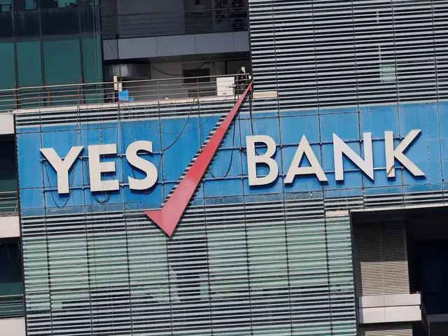 Yes Bank Macquarie Double Downgrades Yes Bank Cuts Target Price