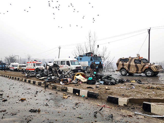 Senior Army personnel pays tribute during a ceremony to mark the fifth  anniversary of the Pulwama attack at the memorial #Gallery