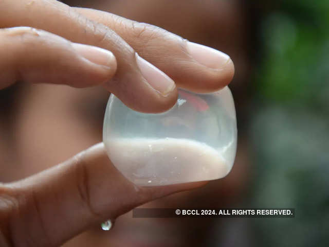 Use Your Hands To Lift Large Ice Cubes. Stock Photo, Picture and