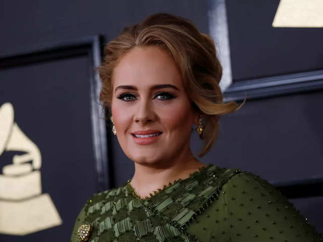 Adele says new album will explain her divorce to her young son - BBC News