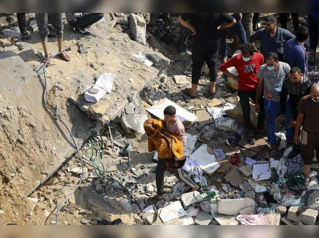 gaza: ''A curse to be a parent in Gaza'': More than 3,600 Palestinian  children killed in just 3 weeks of war - The Economic Times