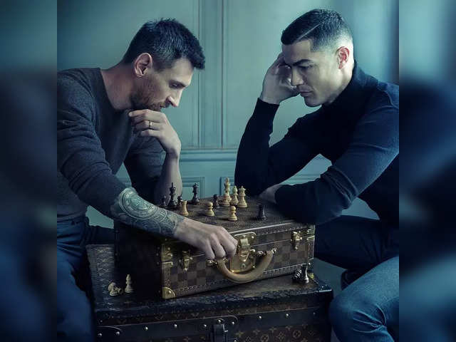 Cristiano Ronaldo and Lionel Messi Taking Photo playing chess in the a
