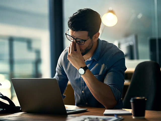 workplace stress: Experiencing headaches & fatigue? Work stresses out 84%  Indian professionals - The Economic Times