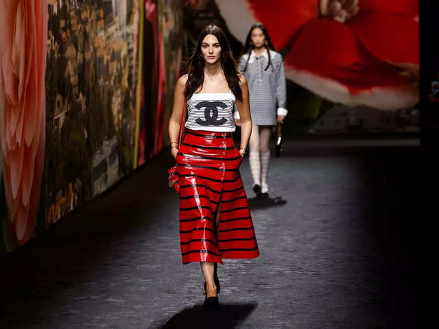 paris fashion week: Beauty in chaos: Chanel showcases uneven hems,  patchwork costumes & flip-flops at Paris Fashion Week - The Economic Times