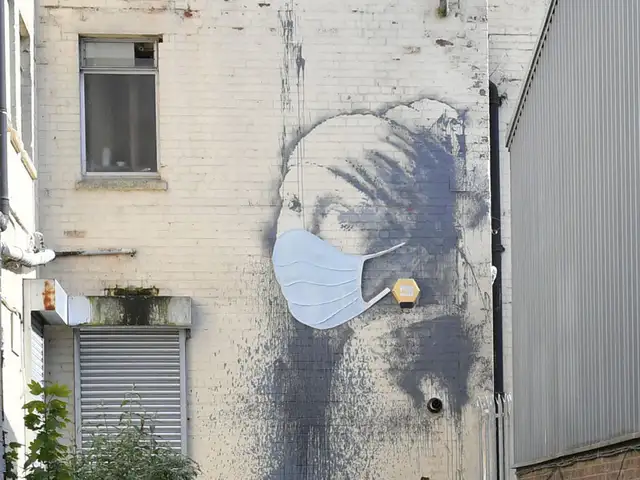 Banksy S Latest Artwork Introduces New Superhero A Nurse The Economic Times