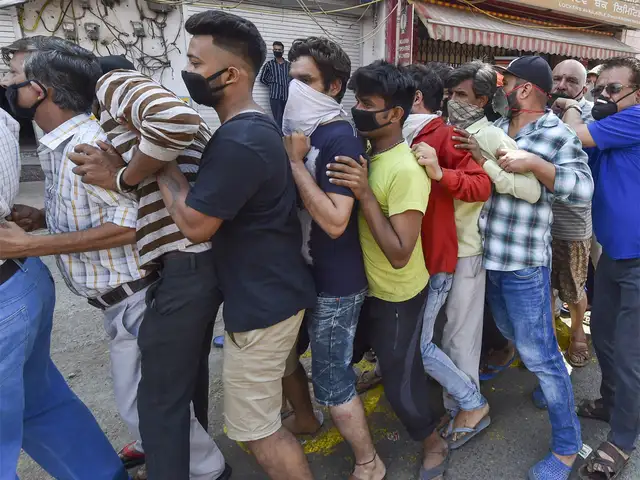 Many liquor shops in Delhi shut after crowd turns unruly, fail to ...