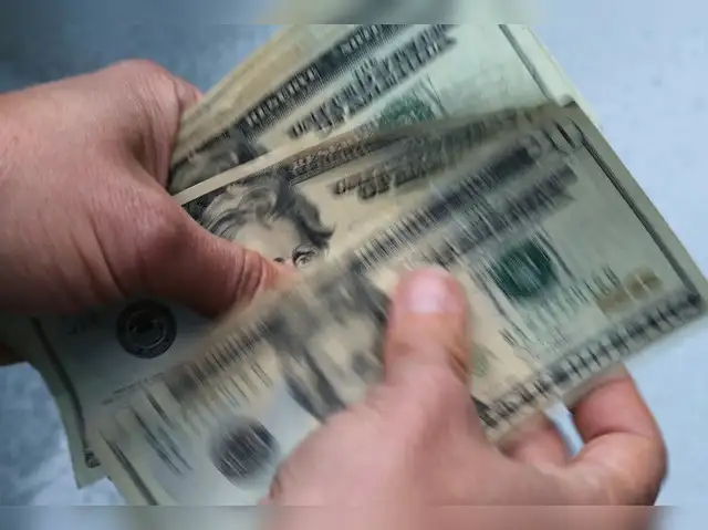 Dollar firms as US-Iran tensions lift oil, hawkish Fed bets build