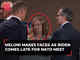 Meloni makes faces as Biden comes late for NATO...